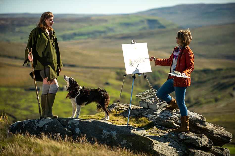 Anita Bowerman painting The Yorkshire Shepherdess and her sheepdog at Ravenseat