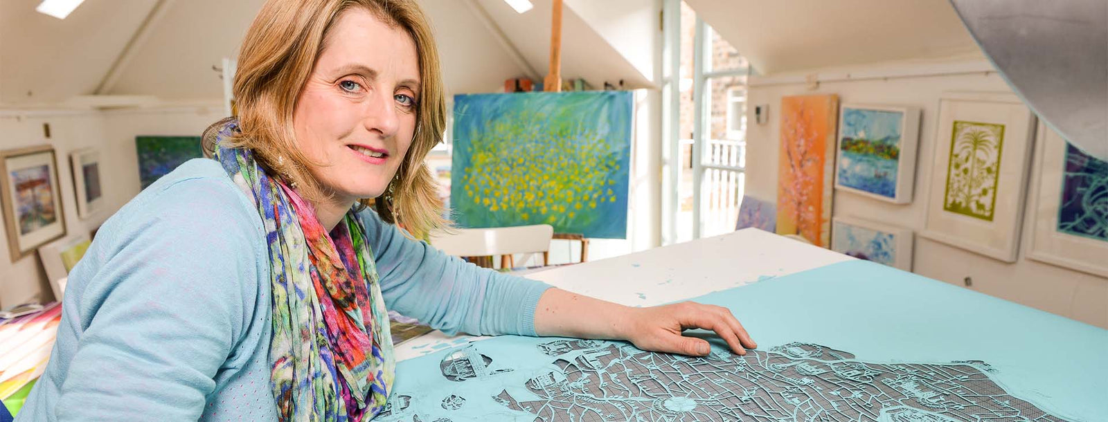 Anita Bowerman with Tour de France paper cutting artwork